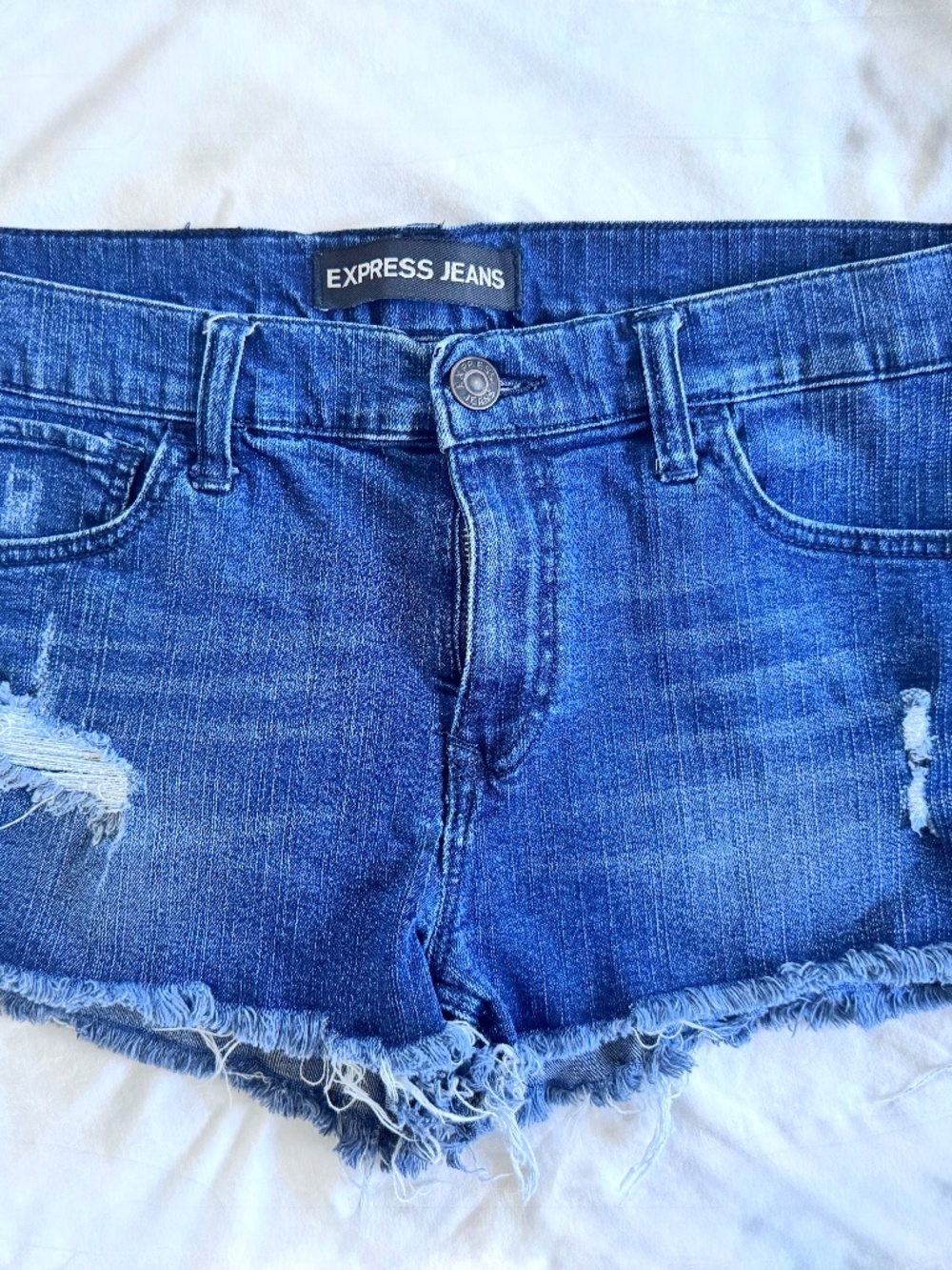 Distressed jean shorts